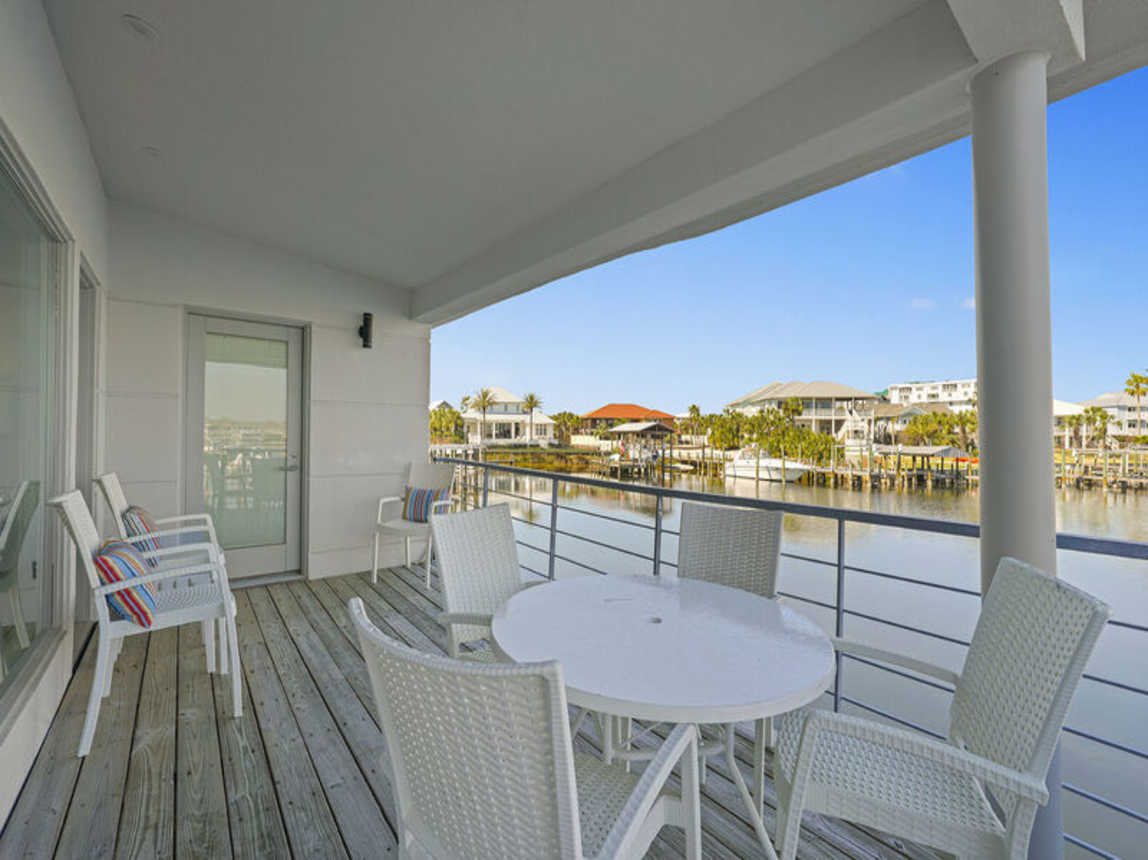 The Boat House - Beautiful Waterfront Vacation Rental with Boat Dock and Amazing Views from the Balcony on Holiday Isle in Destin, Florida - Five Star Properties Destin/30A