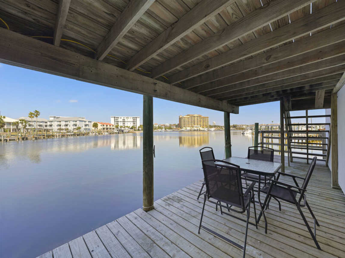 The Boat House - Beautiful Waterfront Vacation Rental with Boat Dock and Amazing Views from the Balcony on Holiday Isle in Destin, Florida - Five Star Properties Destin/30A