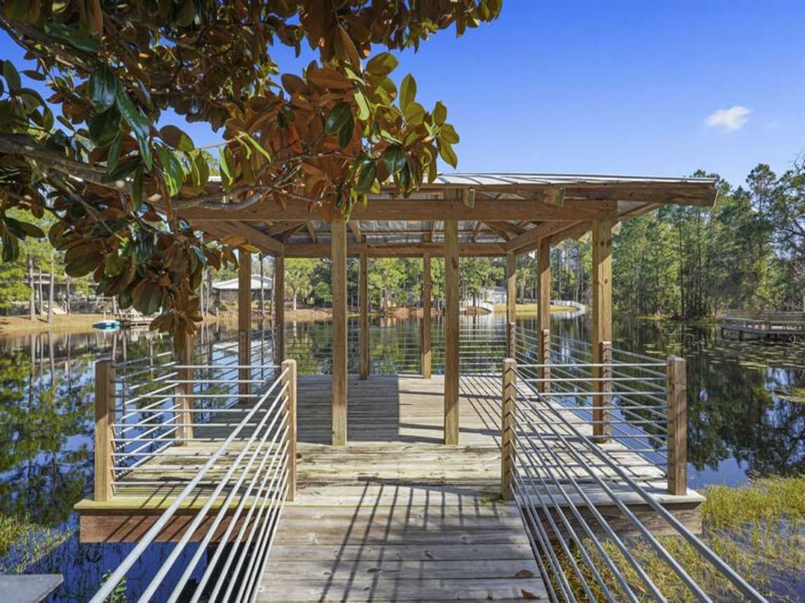 Sea-Renity - Lakefront Vacation Rental House with Private Pool and Lake Dock in Gulf Pines Miramar Beach, Florida - Five Star Properties Destin/30A