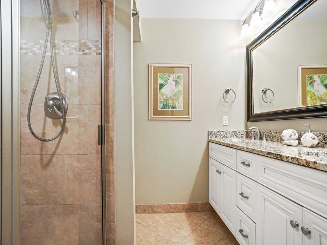 Masterbath features granite counters with dual sinks and plenty of cabinet storage. Step in tiled shower. All amenities include bath linens, shampoo, conditioner, body wash and lotions.