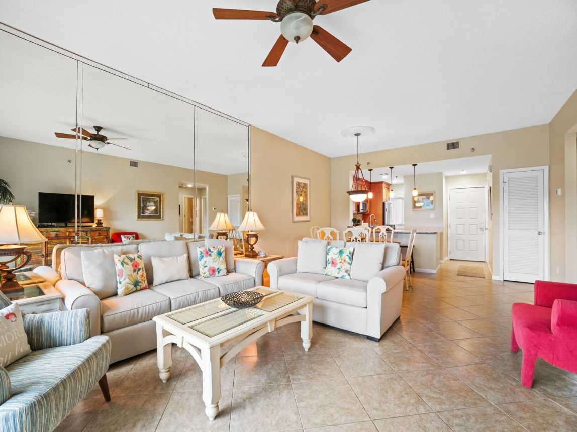 The spaciousness of the living area shows there is enough room to spread out and chill out. Mirror wall gives an open roomy vibe.