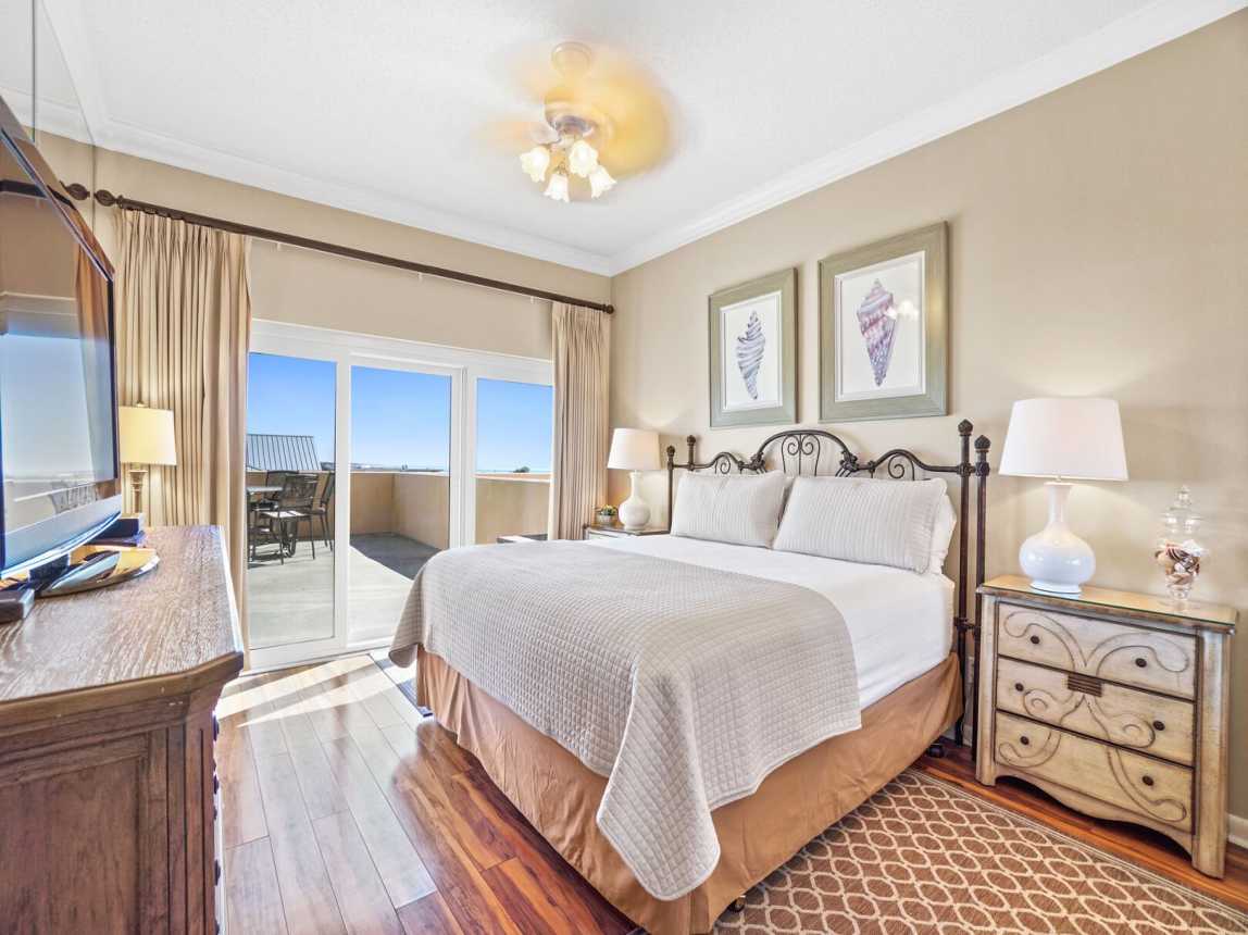 This master suite brings you a plush kind bed with fresh crisp linen and lite coverlet for your comfort.