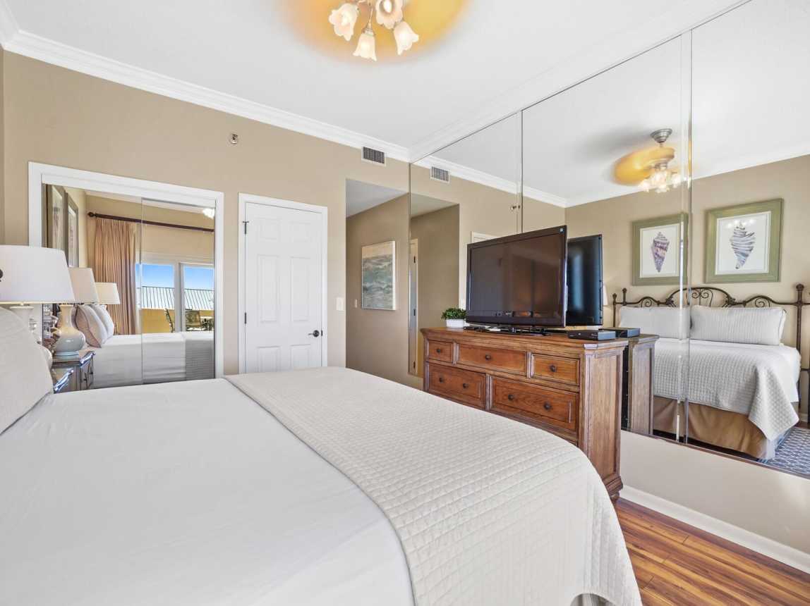 King Bed | dresser - plenty of closet space - hall to bathroom.