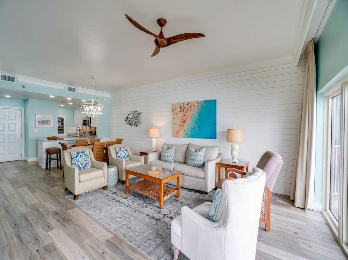 New shiplap wall with deco artwork, a comfy double sleeper sofa bed, a  ceiling fan for those warm summer evenings and a gorgeous view for those awesome sunrises and sunsets.