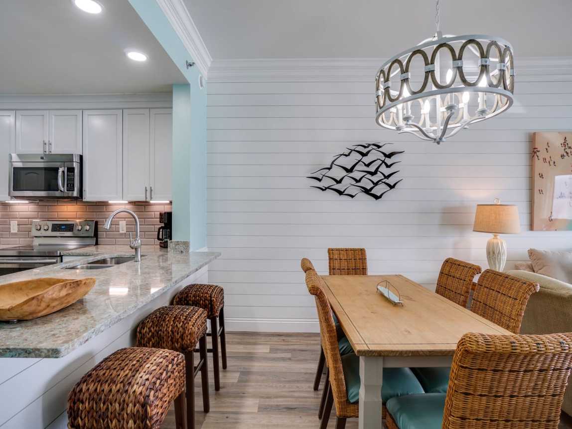 Breakfast bar with 3 stools and a nice roomy table for 6 for dinining or game night.