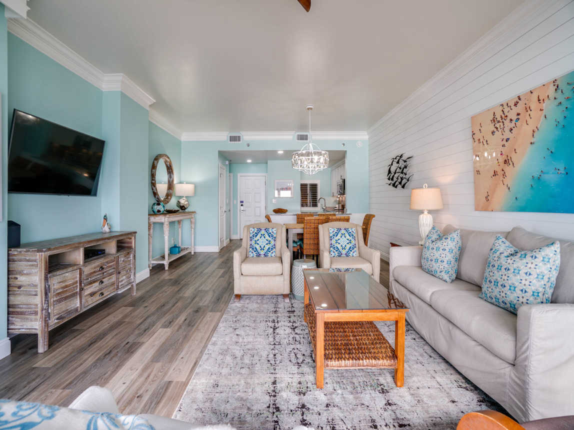 Open concept area of the living area that is great for conversation and entertaining. Flat screen TV with all the cable channels.