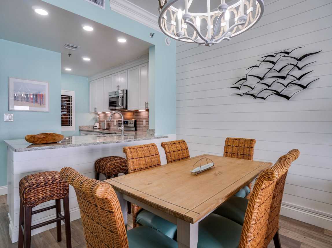 Dining table that seats 6 with a set of counter stools for a quick snack or breakfast.