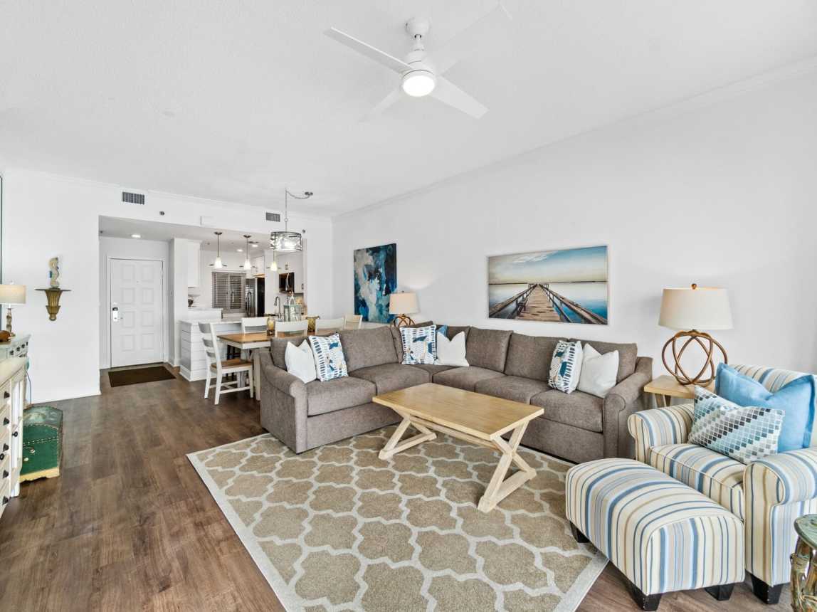 Open living area for everyone see and hear what's happening for the day. Enjoy the coastal vibe with the muted but colorful furnishings and decor through out. Sofa has a pull out queen bed.