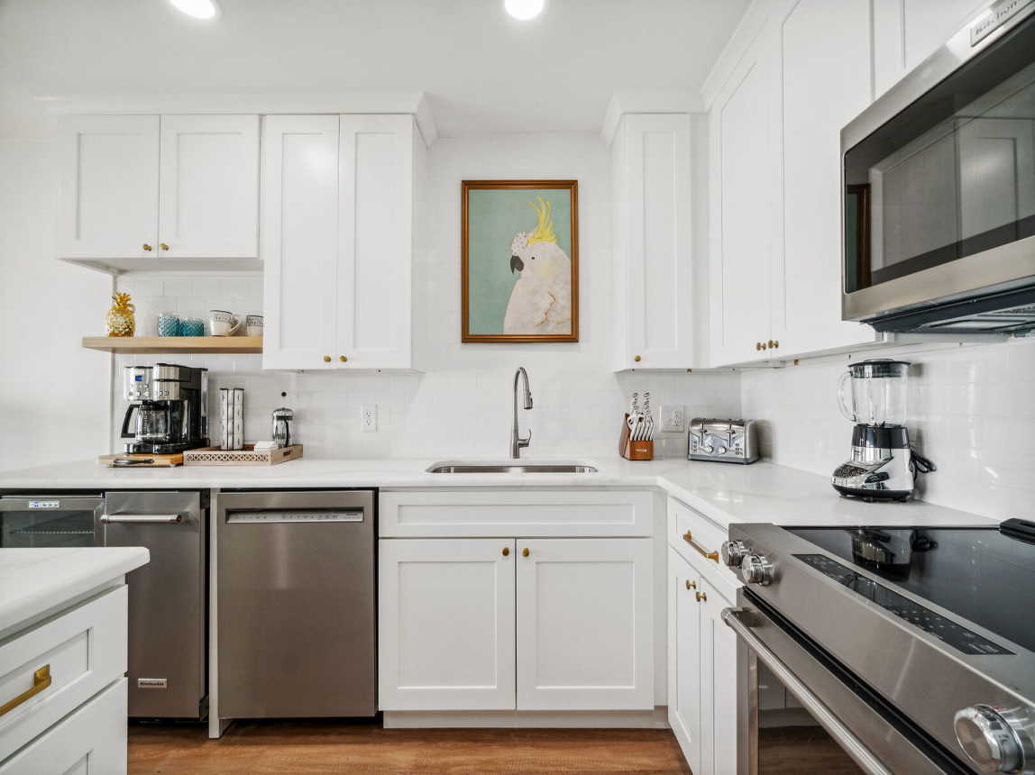 Who wouldn't enjoy preparing a meal in this kitchen with all the necessities at your disposal. Don't forget that awesome view out your back door.