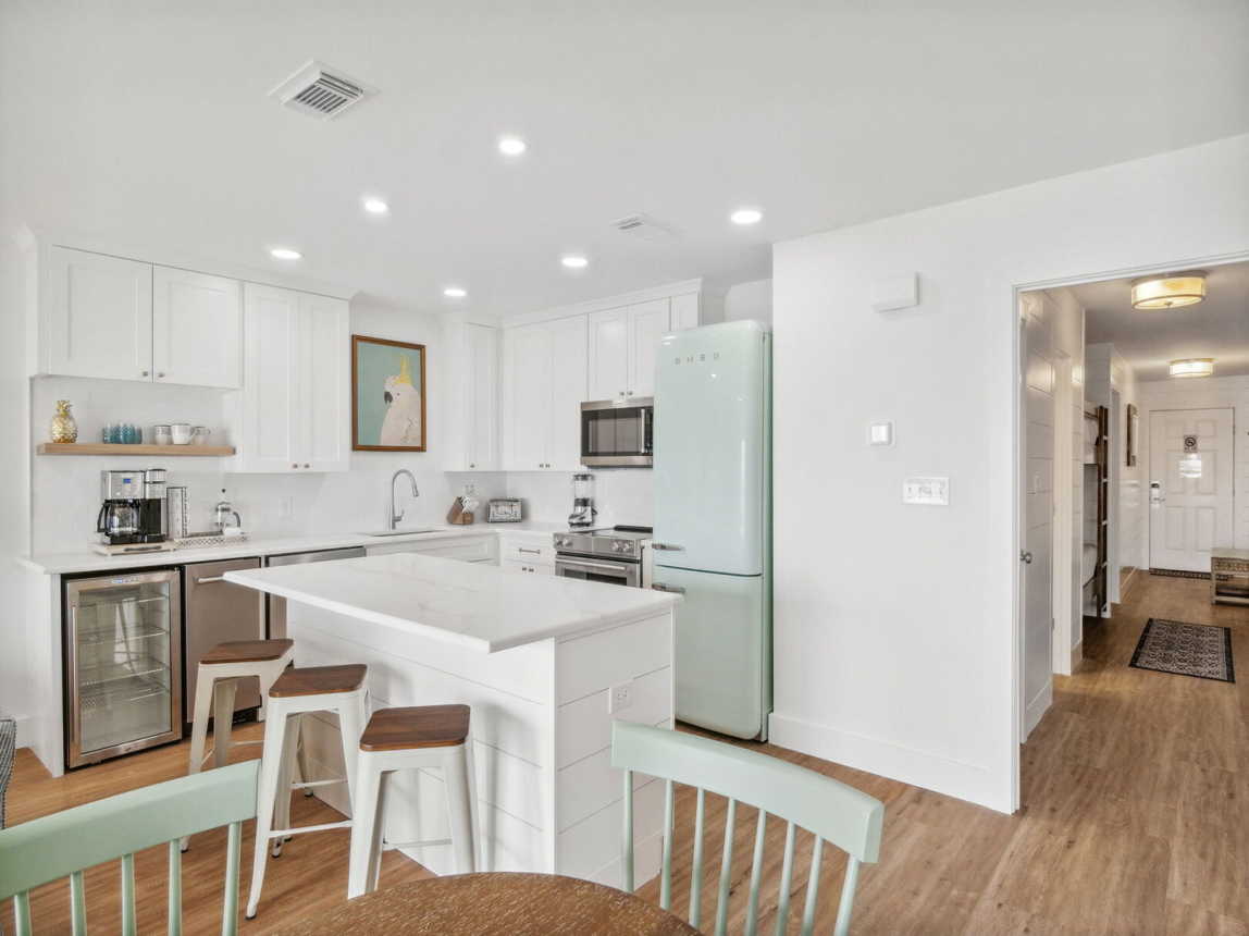 The kitchen has all you need to prepare a gourmet meal or something as simple as lunch. Dinnerware, glassware, utensils, cookware, dish washer, coffee pot, blender, toaster, microwave and stove/oven. And let's not forget the wine cooler to keep all those 