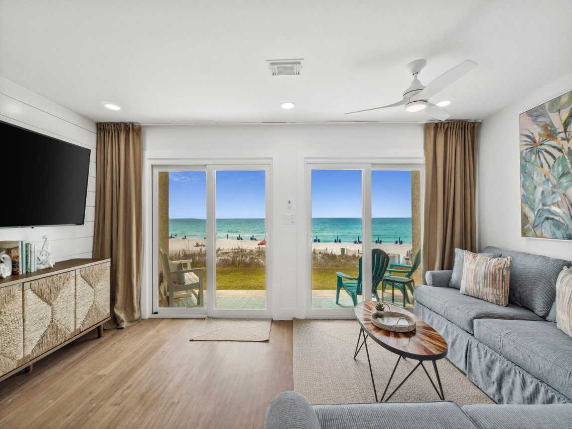 In this 1st floor condo you are just steps to the patio and grounds of this property. What a lovely view! The waves are certianly calling!