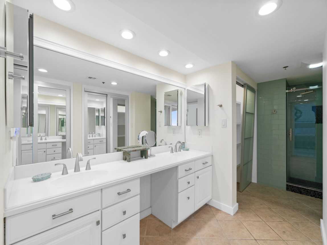 Ensuite provides plenty of room to share with a double vanity, full vanity mirror and plenty of storage space for all your bathroom necessities.