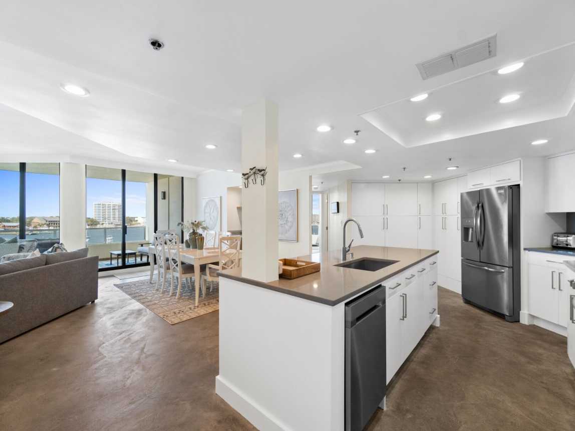 Amazing view from the kitchen. You will never get tired of it! And look at all those cabinets where you will find anything and everything you need to prepare and enjoy a meal or two.