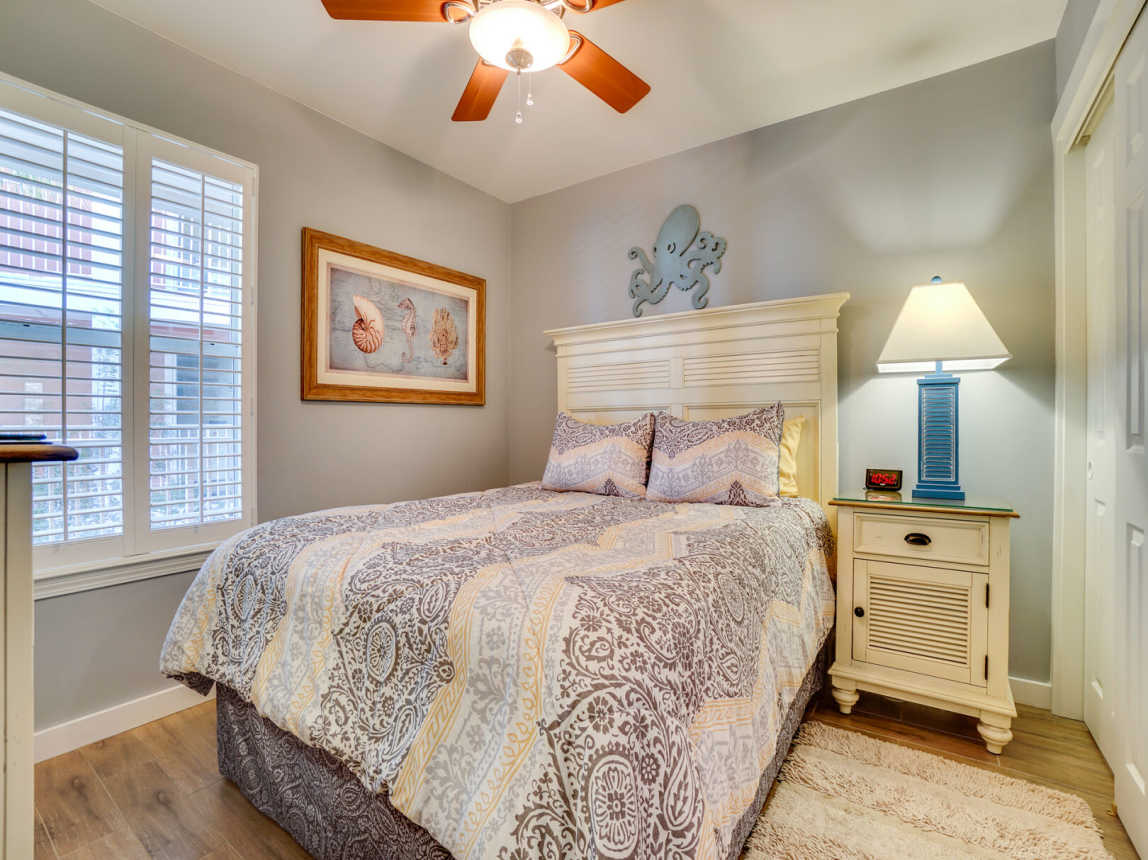 Comfortable queen size bed with crisp linen, clothes closet and access to the large bathroom.