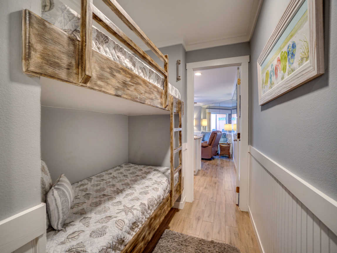 Bunkbeds nestled in down the hallway away from all the activities but next door the the Master.