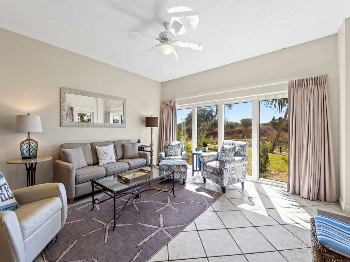 Comfy and cozy living room with beautiful garden views and outdoor play area.