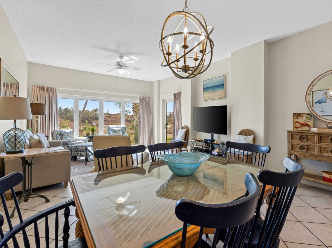 Enjoy the openness of the living area with plenty of space for dining, relaxing, and enjoying the view.