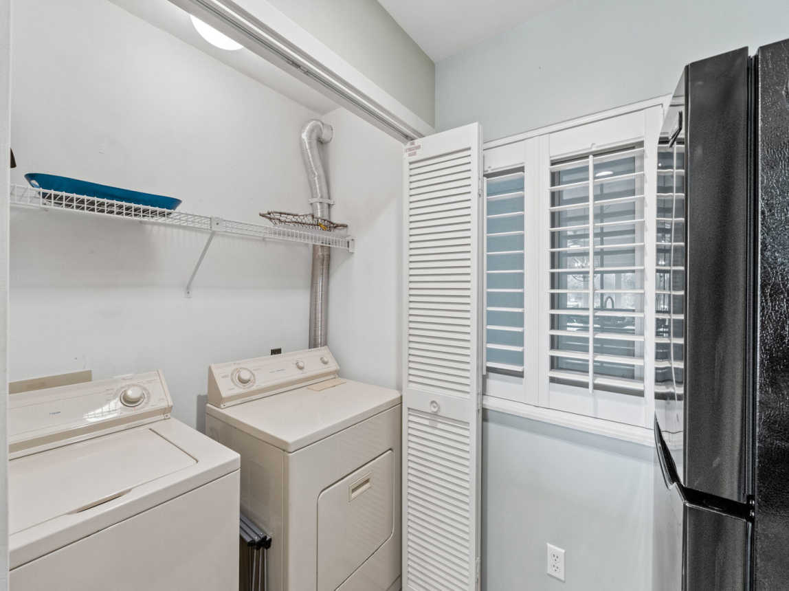 As part of the kitchen area you will find a full size washer and dryer with a small bottle of detergent to get you started for your convenience.