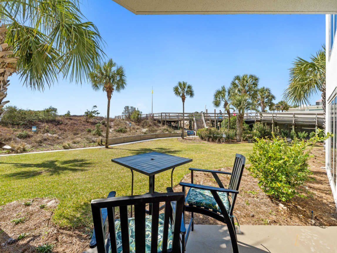 Enjoy the serene patio garden area just off the Living room and Master Suite. Small table and chairs provided to sit and enjoy the cool gulf breeze and warm sunshine. There is even a grassy area for the kiddos to burn off some of that pent up energy.