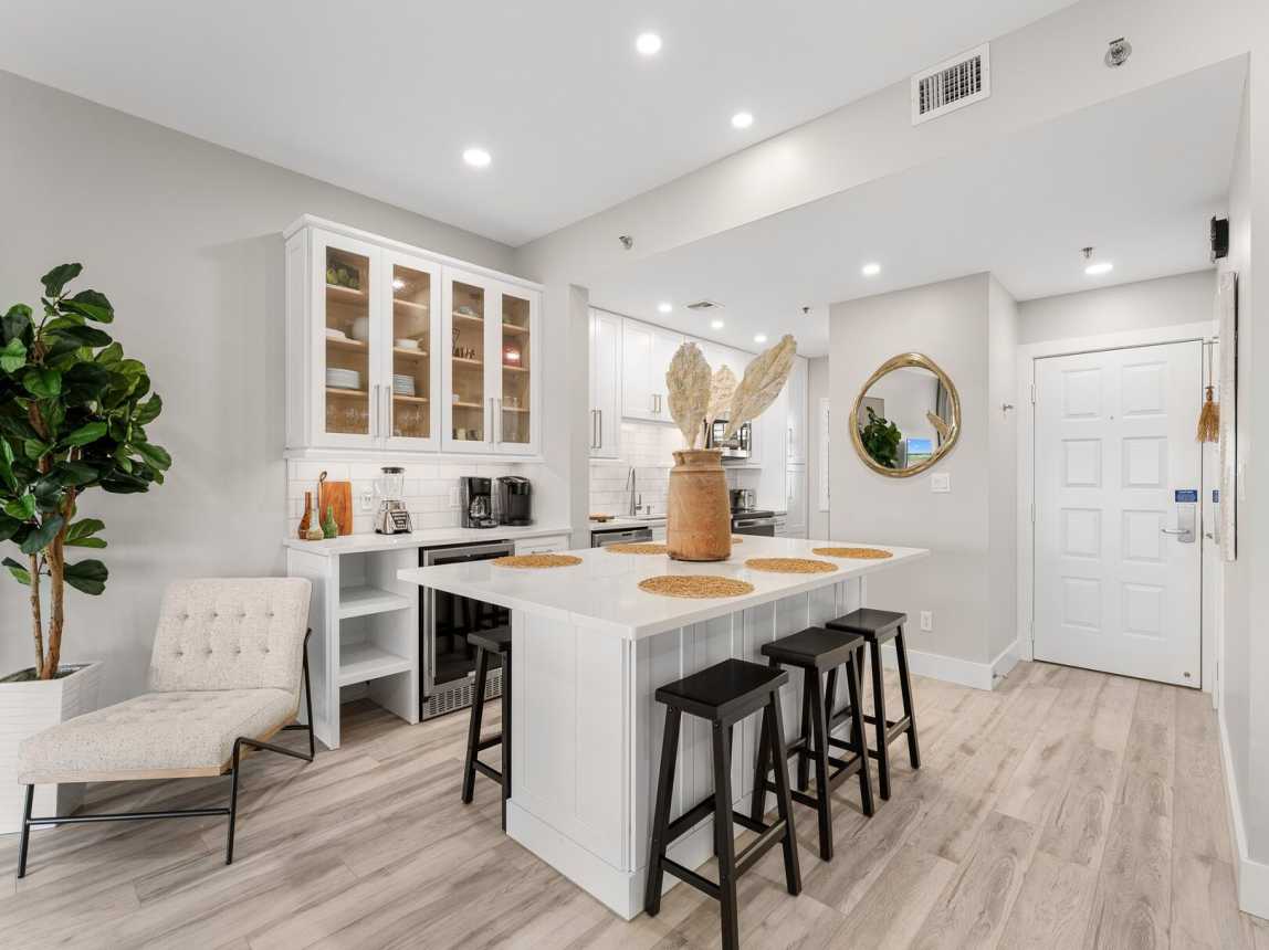 Very open and spacious kitchen that provides all the comforts of home, from small appliances, to dinnerware, cookware, glassware and up to date major appliances. Everything you could ask for in a kitchen to entertain, cook, or just sit for while with your