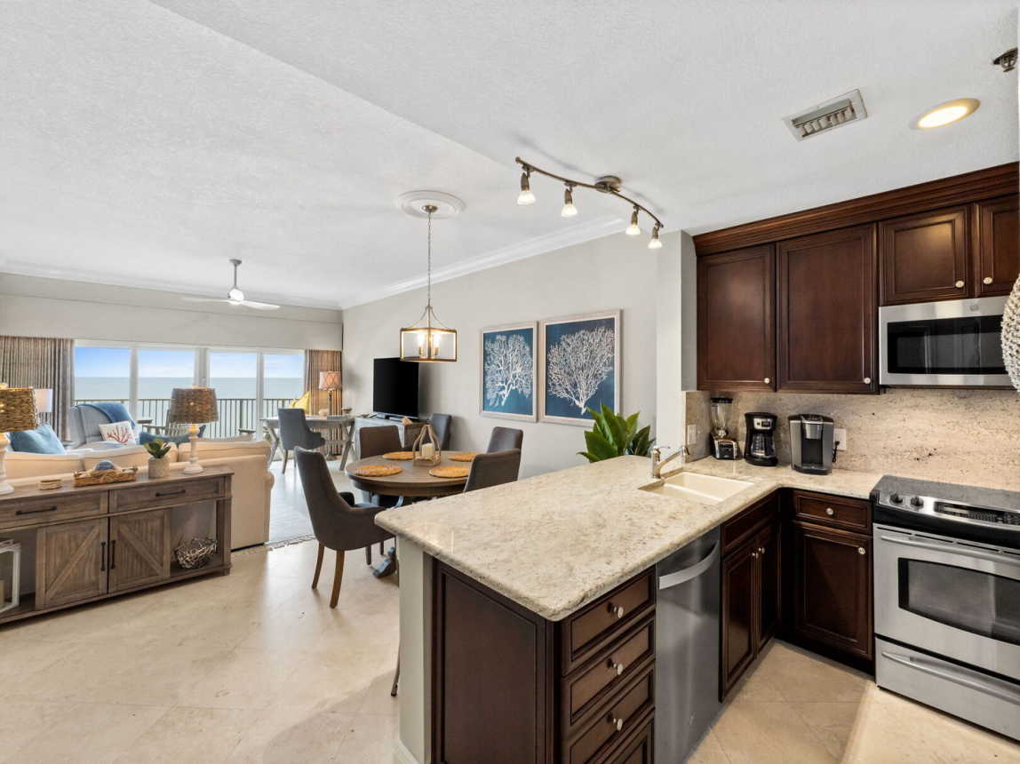 Spacious kitchen breakfast bar for your fav beverage or snack or just good conversation.