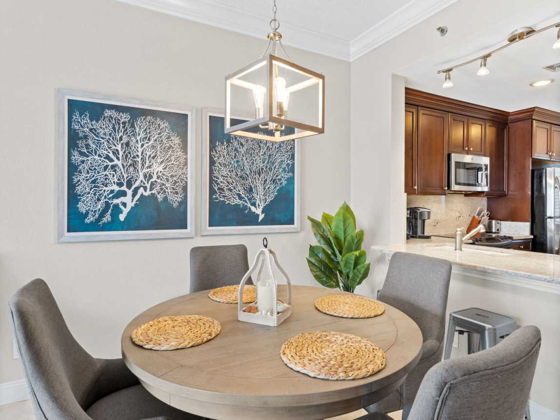 Dining table with comfortable plush chairs for a full meal, snack or for a friendly card game.