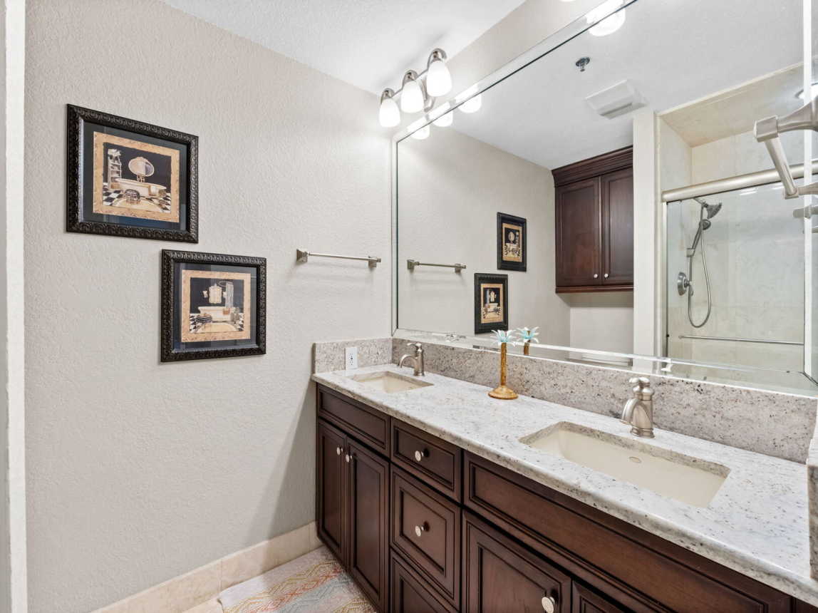 Master Bath with double vaniety and full mirror. Plenty of counter and cabinet space.