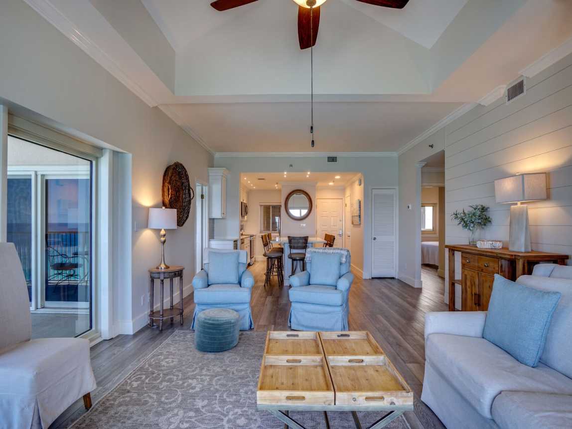 Plenty of seating for everyone to be comfortable while watching the large flat screen TV with cable after a long day of activities.