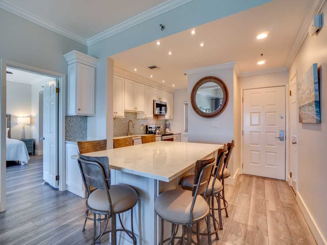 The large island serves as a dining area or just breakfast bar. Seats 7