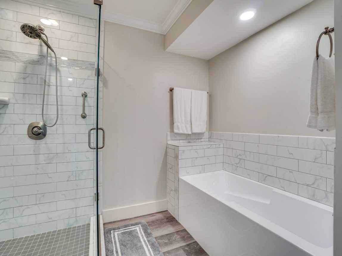 Step in shower or soaking tub greets you to cleanse the sun and sand away after a day at the beach. Enjoy the relaxation of the soaking tub for the spa experience.