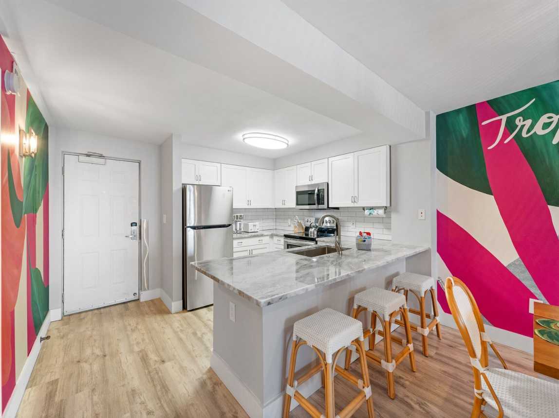 Kitchen with a breakfast bar for 3.