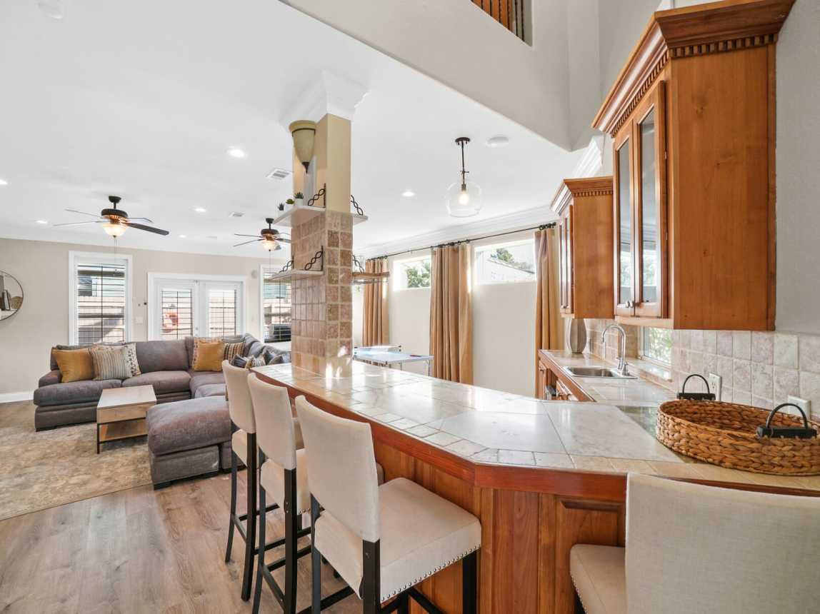 Enjoy an evening beverage from the fully furnished bar with 4 comfortable bar stools. All you need to bring is your favorite libation.