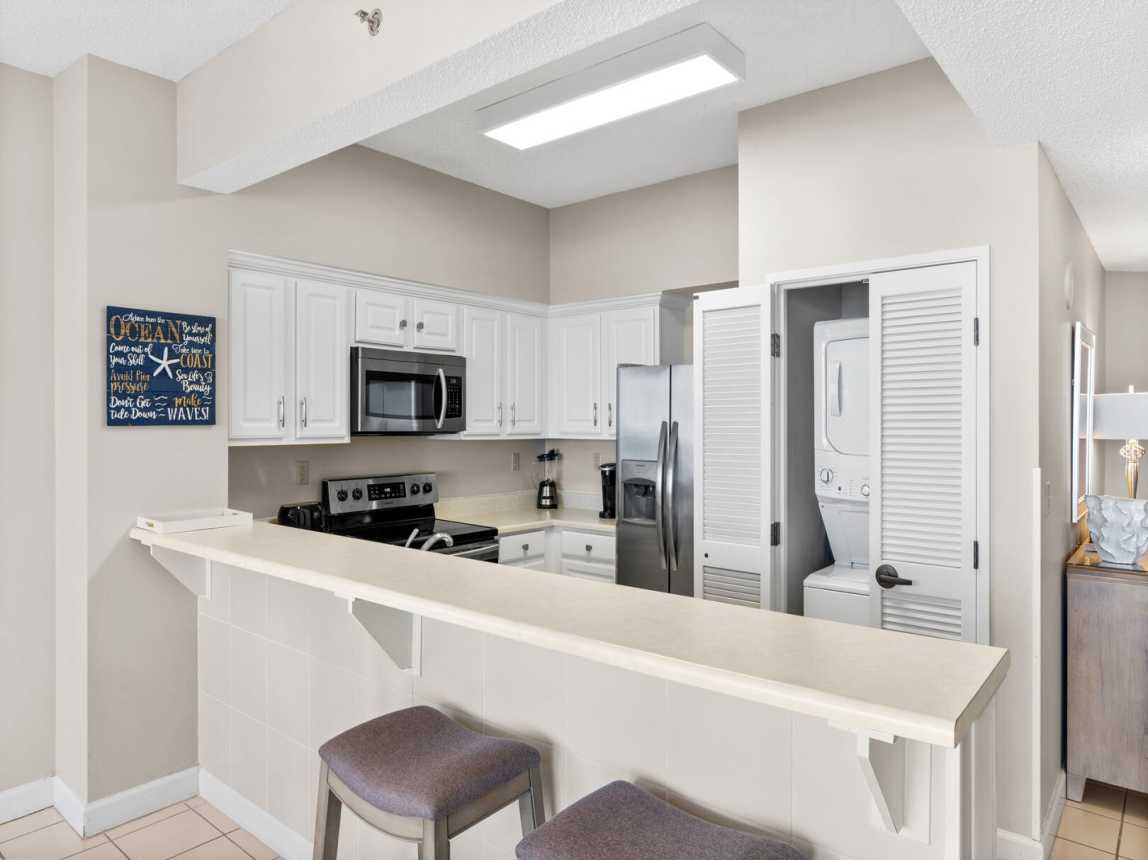 Full size kitchen with large and small appliances, cookware, dinnerware, drinkware, etc. It even provides a stacked washer and dryer for your convenience.
