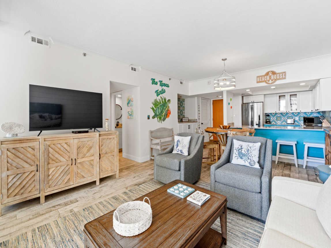Another view of the family living and entertaining area. Notice the hand painted Tipsea Sea Turtle on the wall.