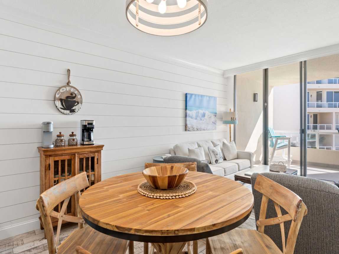 Dining area provides a solid wood table and chairs with seating for 4.