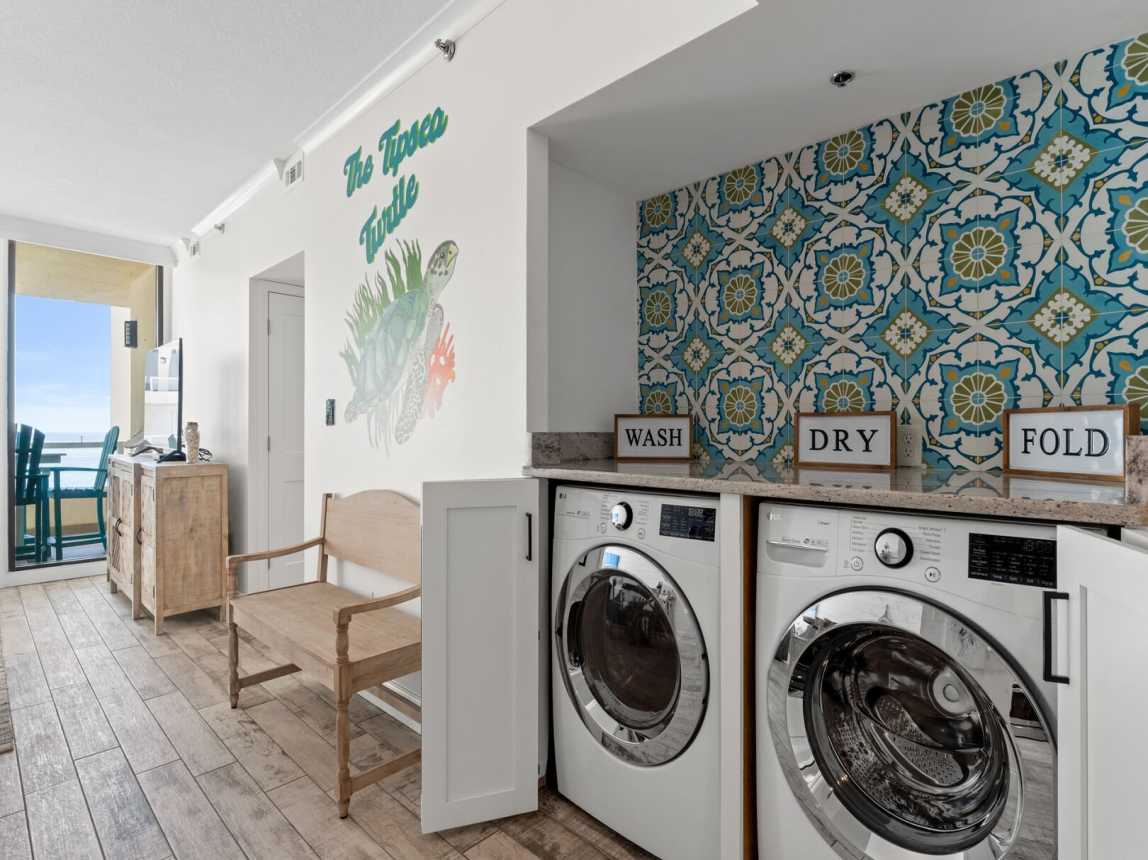 The laundry area is just inside the front entry what provides full size washer and dryer along with a folding counter for easy laundry day. If you so desire! There are bi-fold doors to close off the area of temptation.