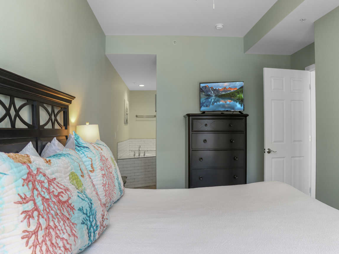 Bedroom 3 with TV and Master Bathroom