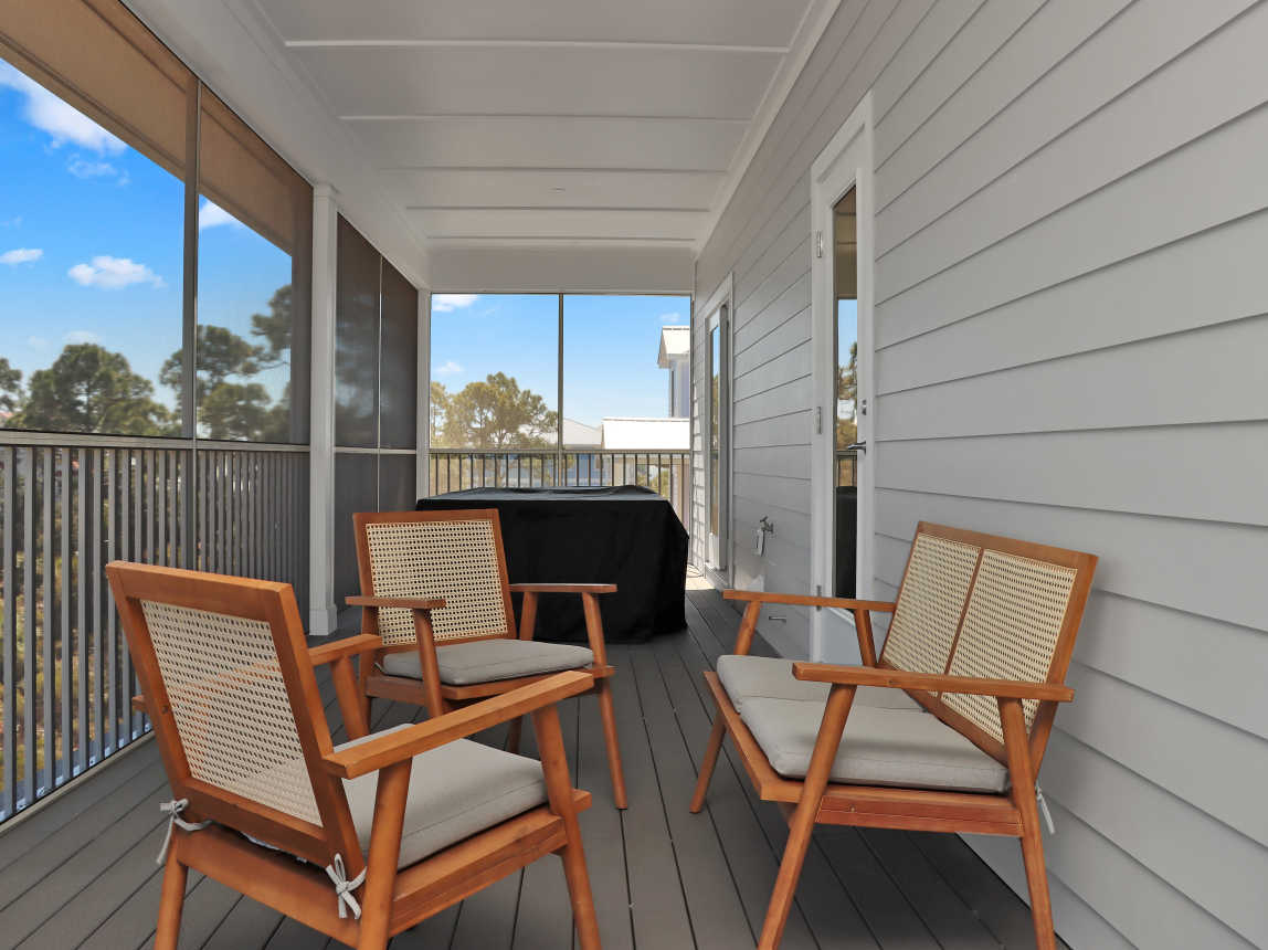 Sitting Area on Top Floor Screened Deck