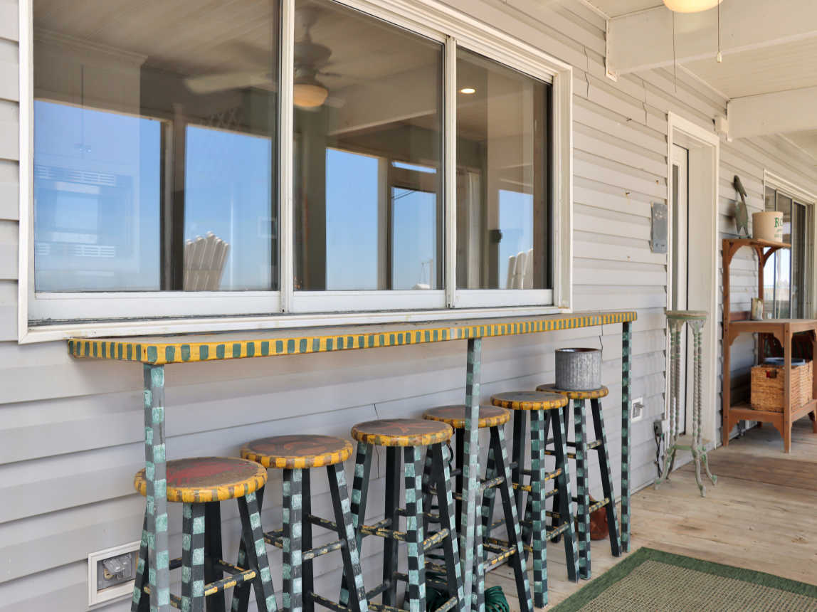 Unique Bar Seating with a View into the Kitchen