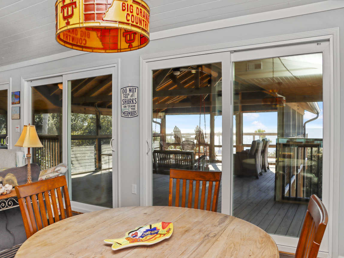 Dining Area with View onto Screened Deck