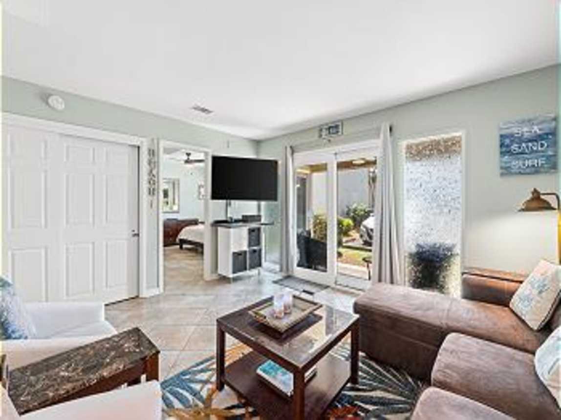 Spacious living room area with plenty of seating for everyone. Walk out patio. Flat screen TV with cable and wifi.