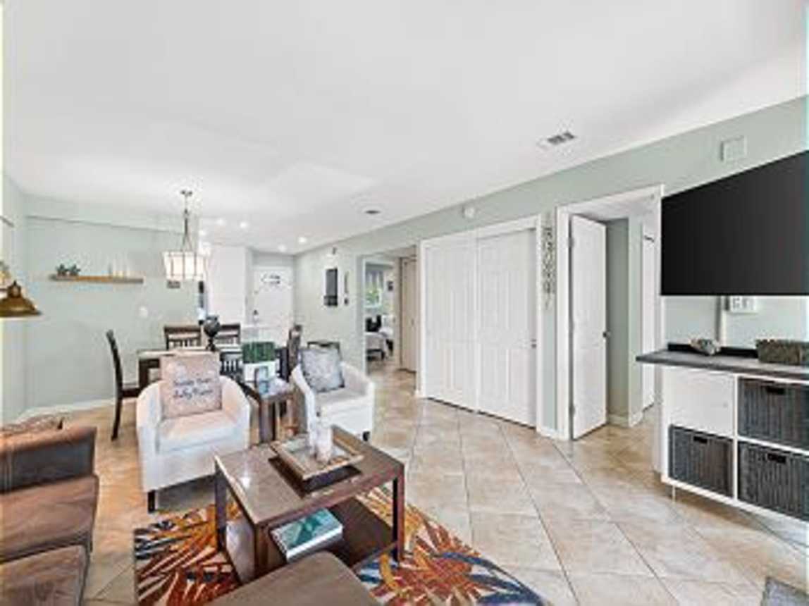 Open and airy, showing entry into the master suite and guest room.