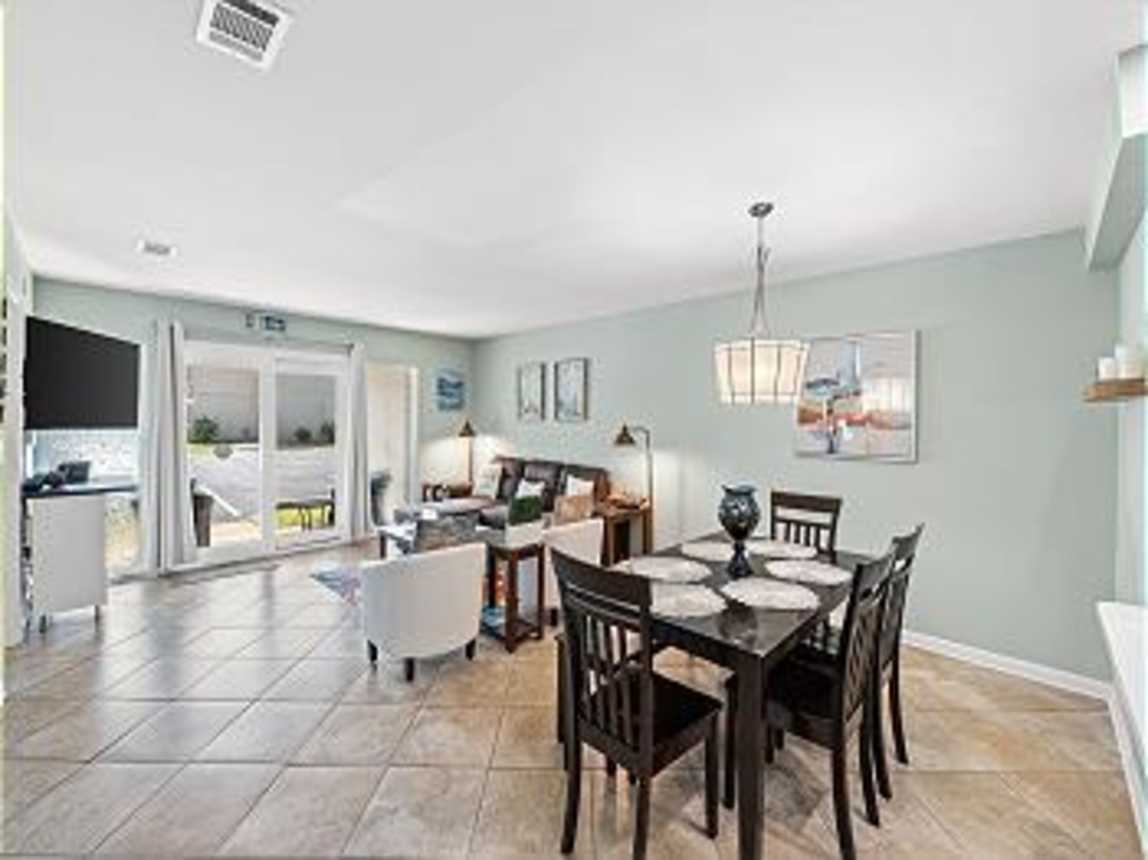Dining area with a table for 6. Great for dining, playing games or just great conversation.