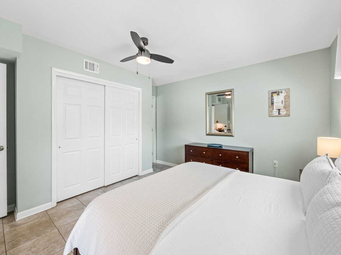 View of master suite - double closet and dresser for plenty of storage during your stay