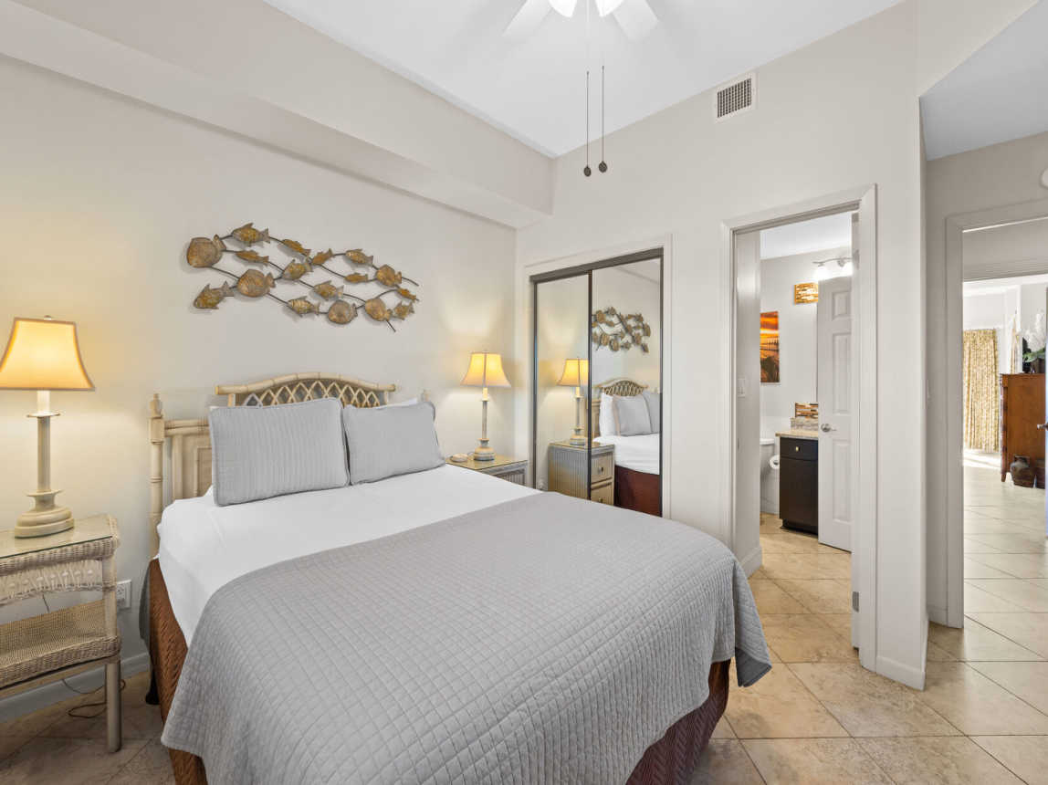 Guest room with a double closet and private access to the hall bath.