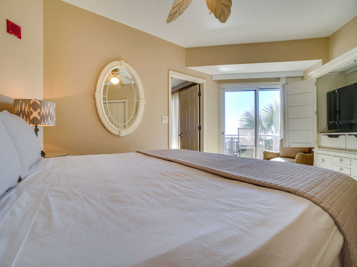 King bed, TV, lounde chair and private entry to your balcony.