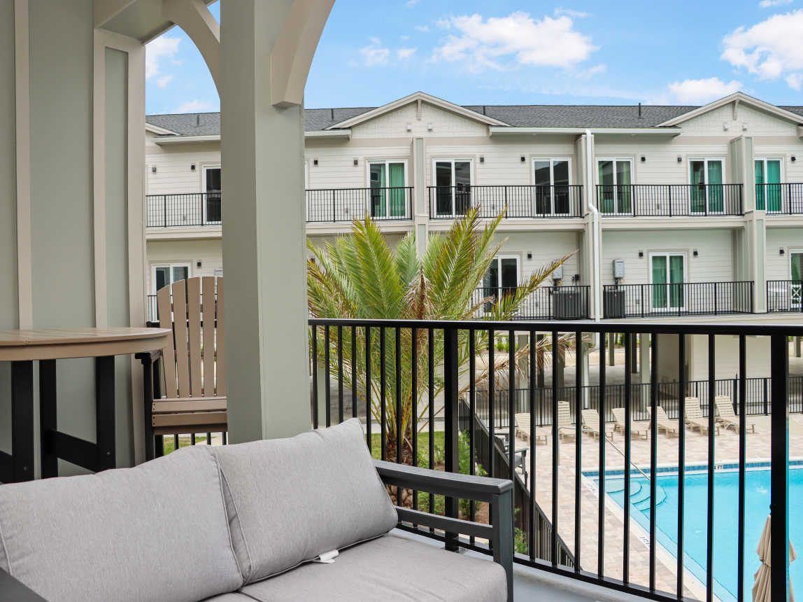 Furnished Deck with View of Pool