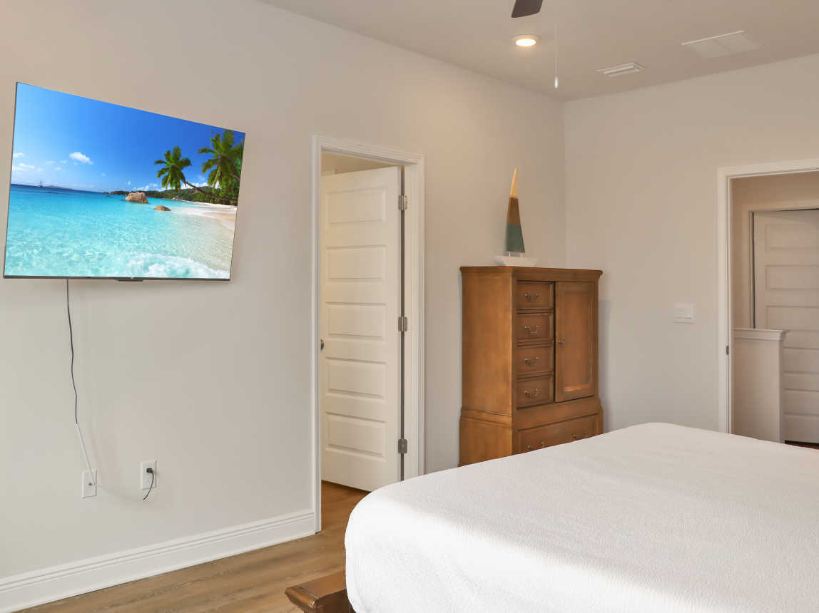 Bedroom 2 with TV and Master Bath