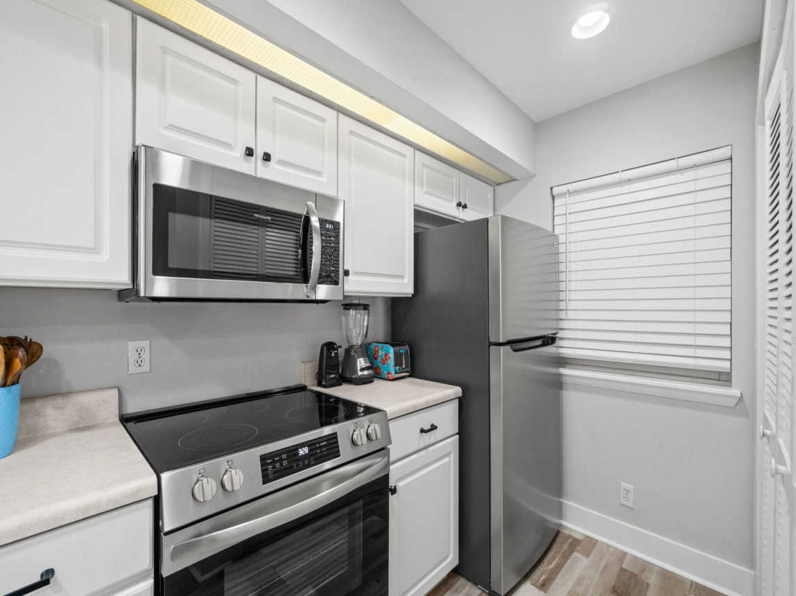 Enjoy the convenience of a complete kitchen with cookware, utensils, and modern appliances.
