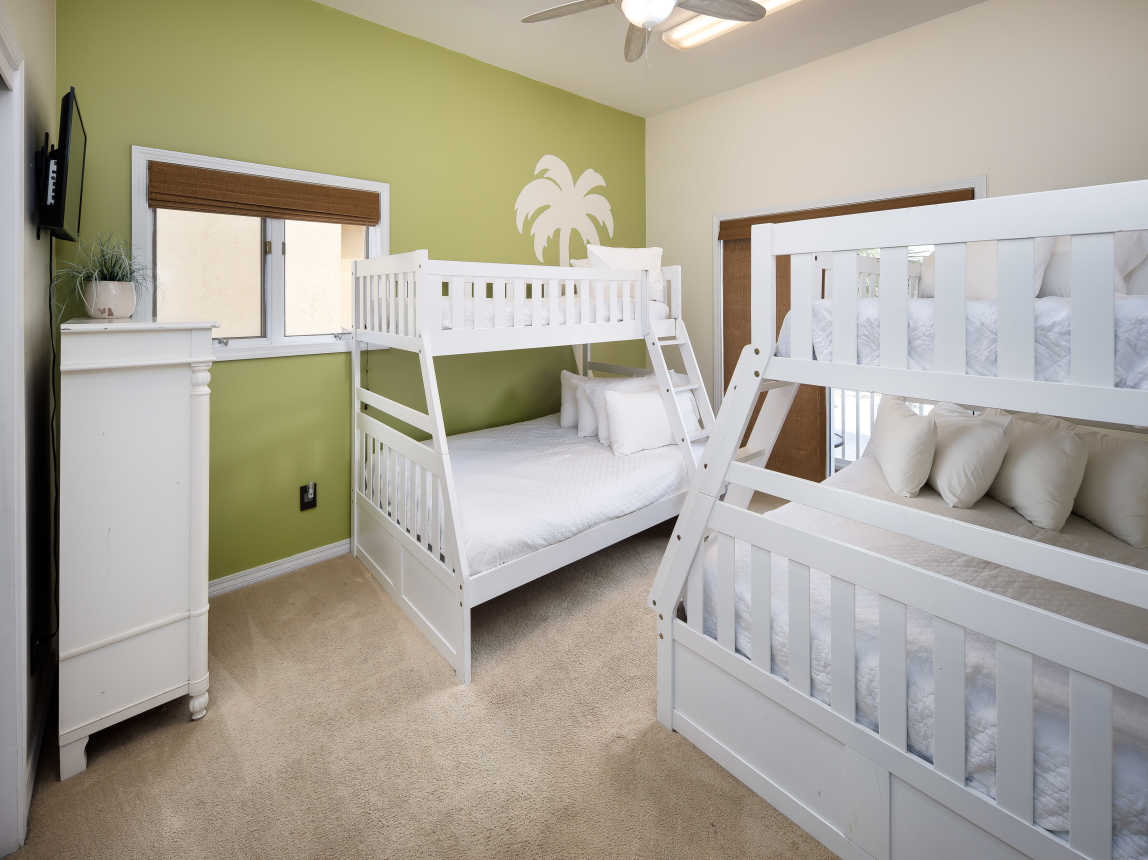 Third bedroom with two sets of bunk beds